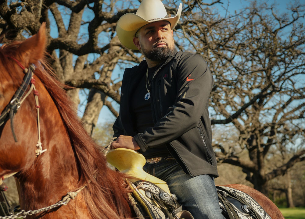 A photo montage of Louie the Singer wearing a cowboy hat.