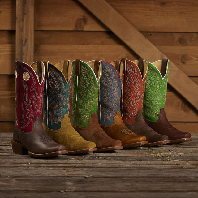 A lineup of the Ante Up Frontier western boot shown in Hickory (brown), Jimmy Frontier Western Boot shown in Wheat suede (tan), Jimmy Frontier Western Boot Shown in Sedona (tan), Show Off Frontier Western boot shown in Bay (brown), Show Off Frontier Western boot shown in oily tan, Jimmy Frontier Western Boot Shown in Russet, and the Show Off Frontier Western boot shown in Bay (brown). Shop Men's Frontier.