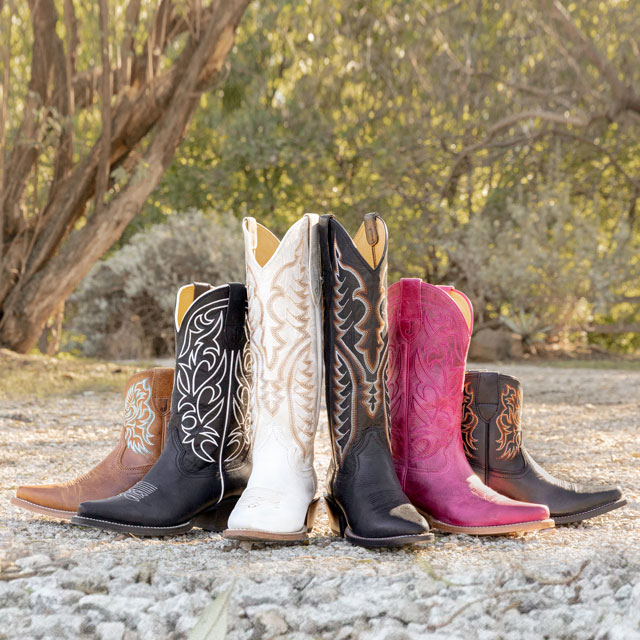 A lineup of the Isabella Vintage Boot in Barnwood (Brown), the Josephine Vintage Boot in Midnight (Black), the Evelyn Vintage boot in Vintage Ivory (White), the Josephine Vintage Boot in Fuchsia (Pink), and the Isabella Vintage Boot in Coal (Black). Shop the Women's Vintage Collection today.