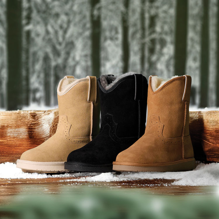 Three pairs of Justin Gypsy Women's Boots in various colors are displayed on a snow-dusted wooden surface. Shop Gypsy.