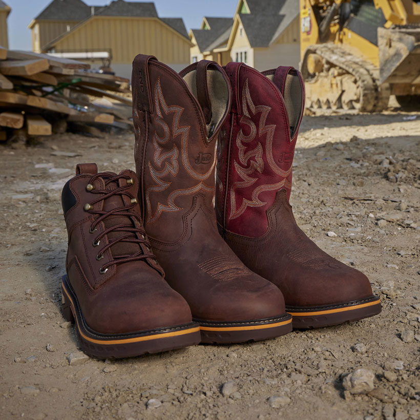 Two Resistor 11" Waterproof Nano Comp Toe work boots in brown with Resistor 6" Waterproof in brown at a construction site with dirt.